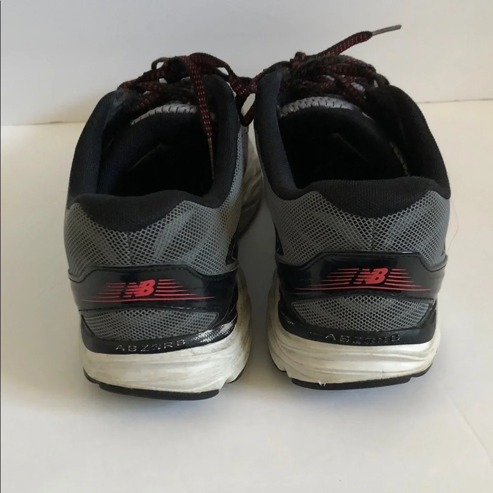 New Balance Gray Athletic Shoes with Red-Accented Laces